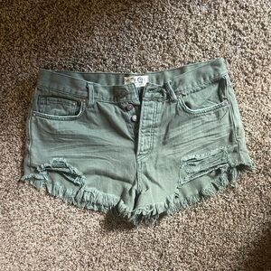 Green jean shorts